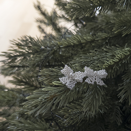 Porcelain white pearl bowknot earrings
